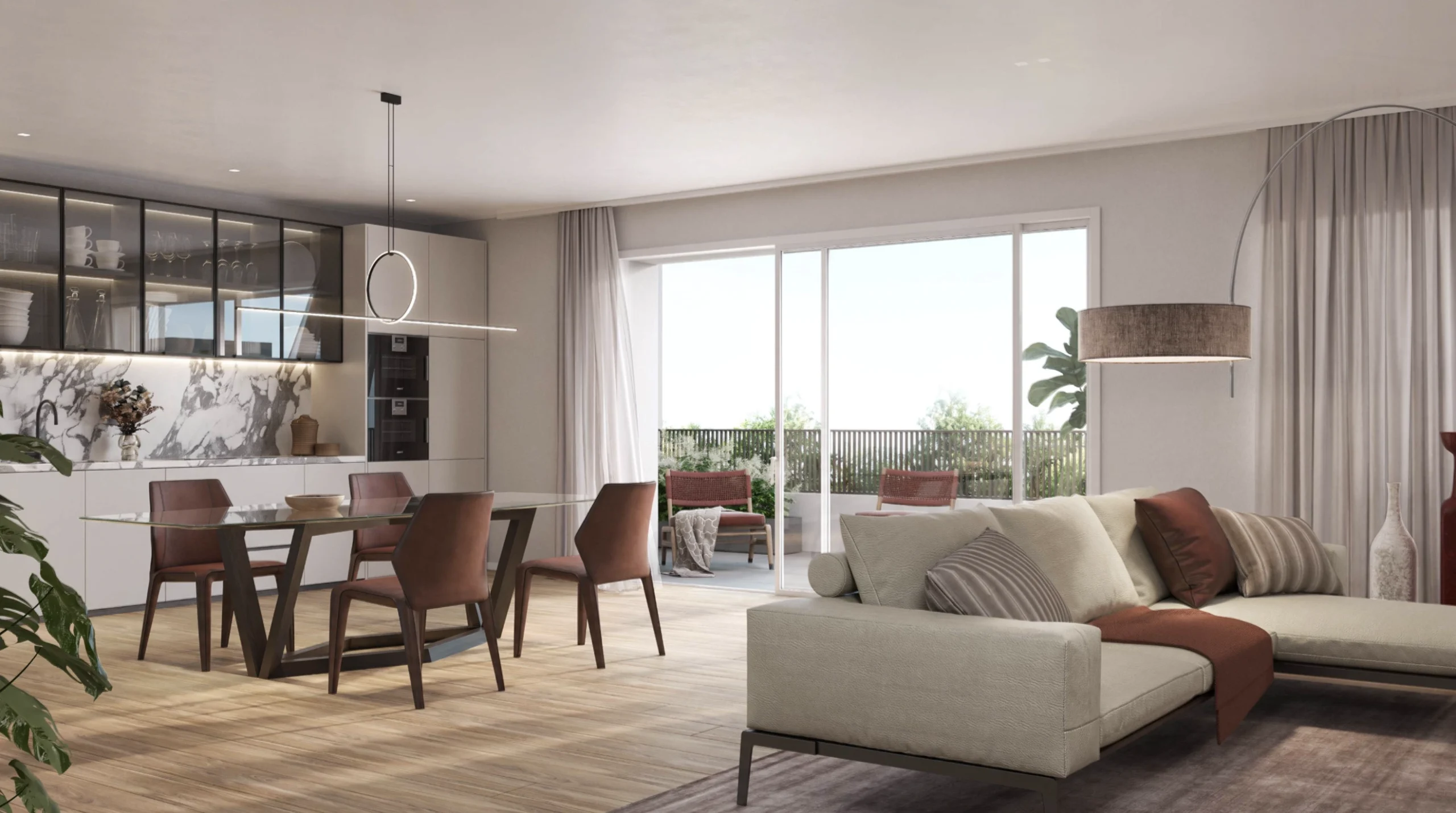 Soggiorno luminoso con cucina open space del Residence Incanto a Desenzano del Garda, finiture di pregio