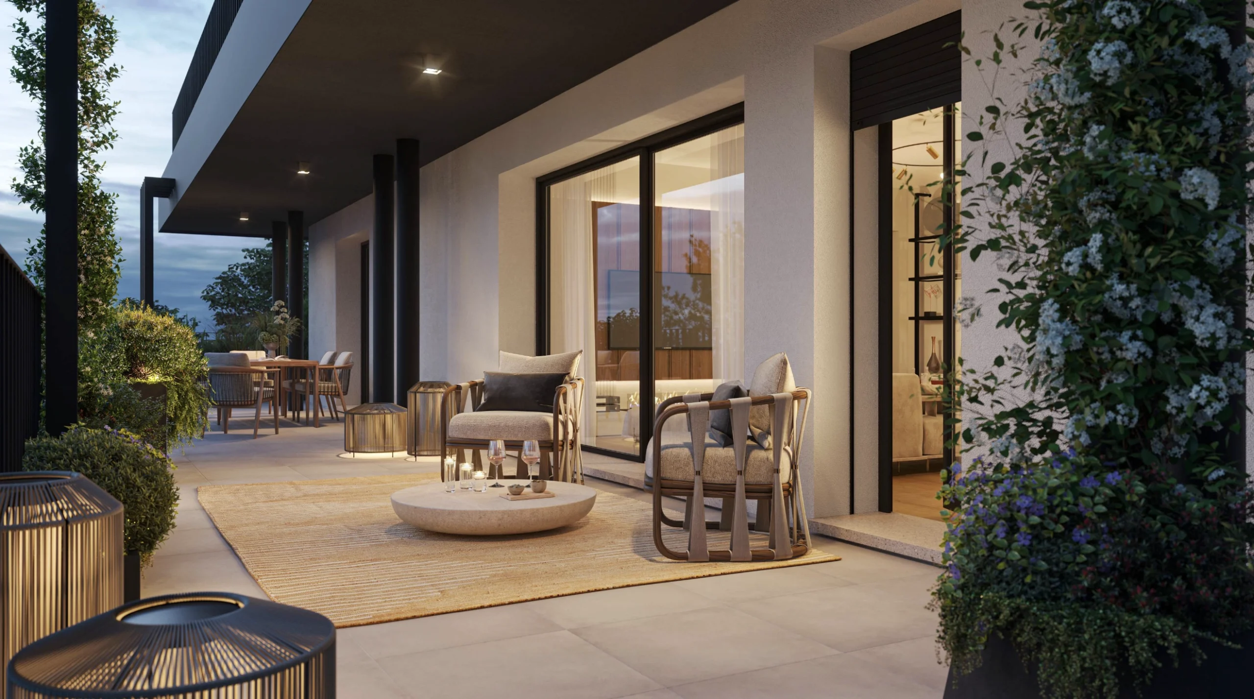 Terrazza serale del Residence Incanto a Desenzano del Garda con arredi outdoor e atmosfera raffinata