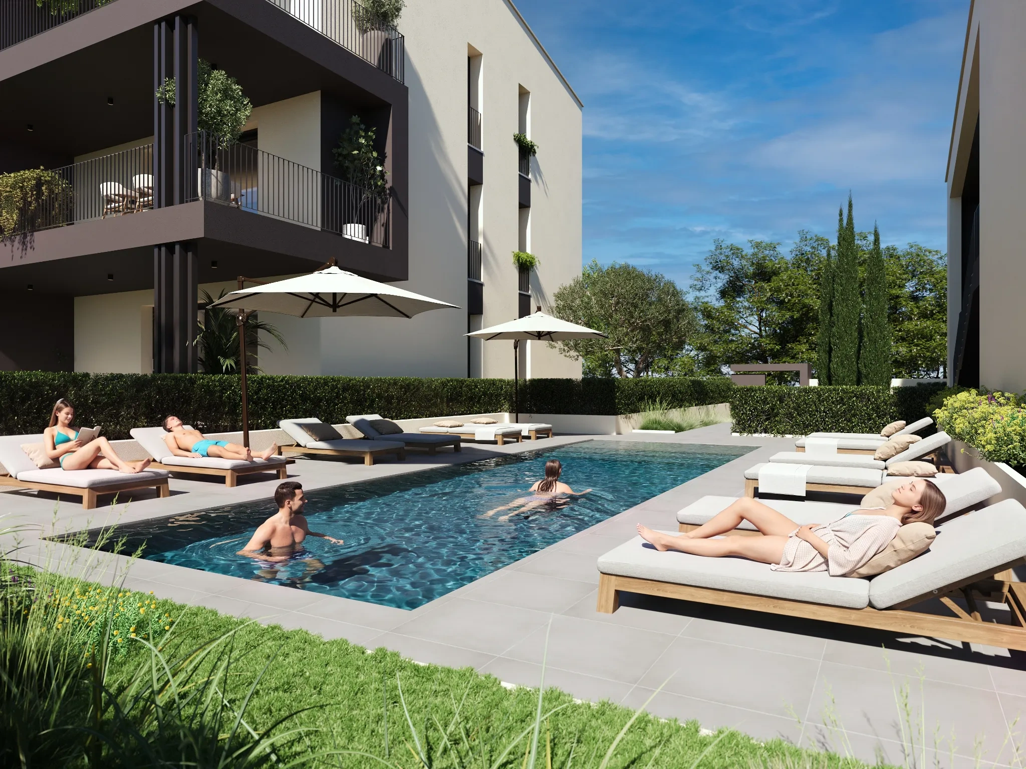 Piscina privata con lettini e ombrelloni tra gli edifici della residenza Alvea